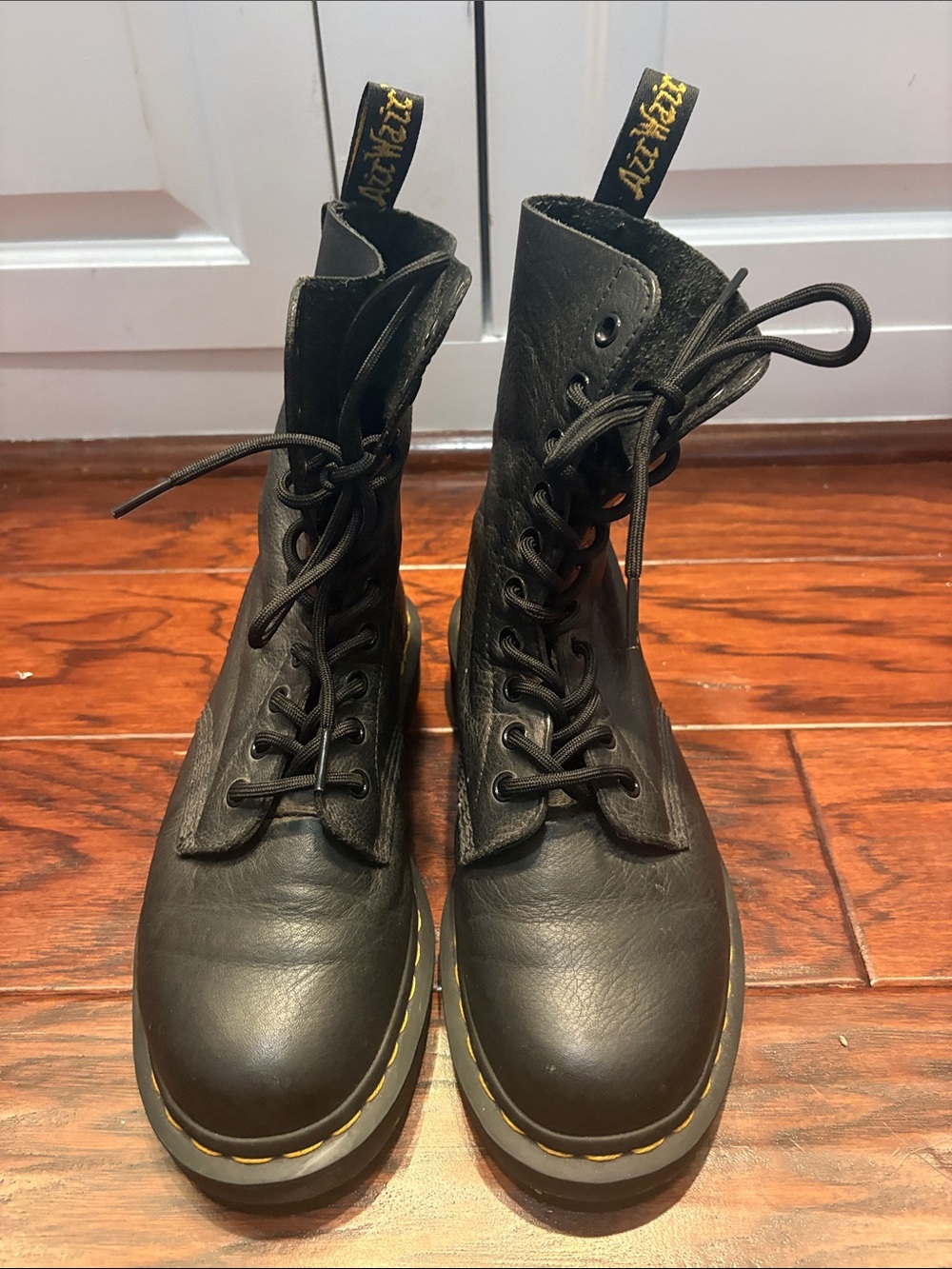 Dr. Martens Black Leather 8-Eye Lace-Up Boots with Yellow Stitching